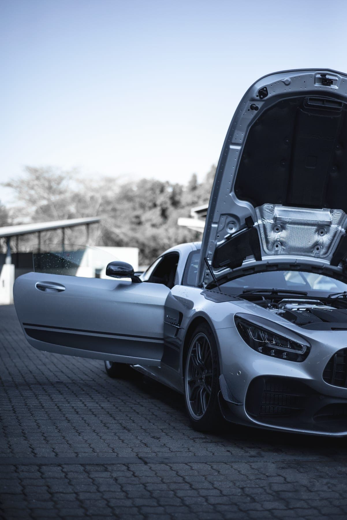 Mercedes-AMG GT with the door and bonnet open
