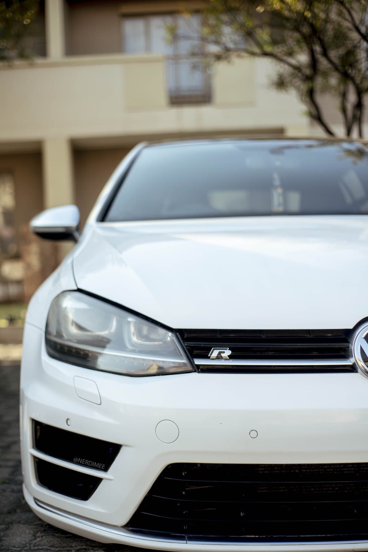 Golf R headlight and R badge, close