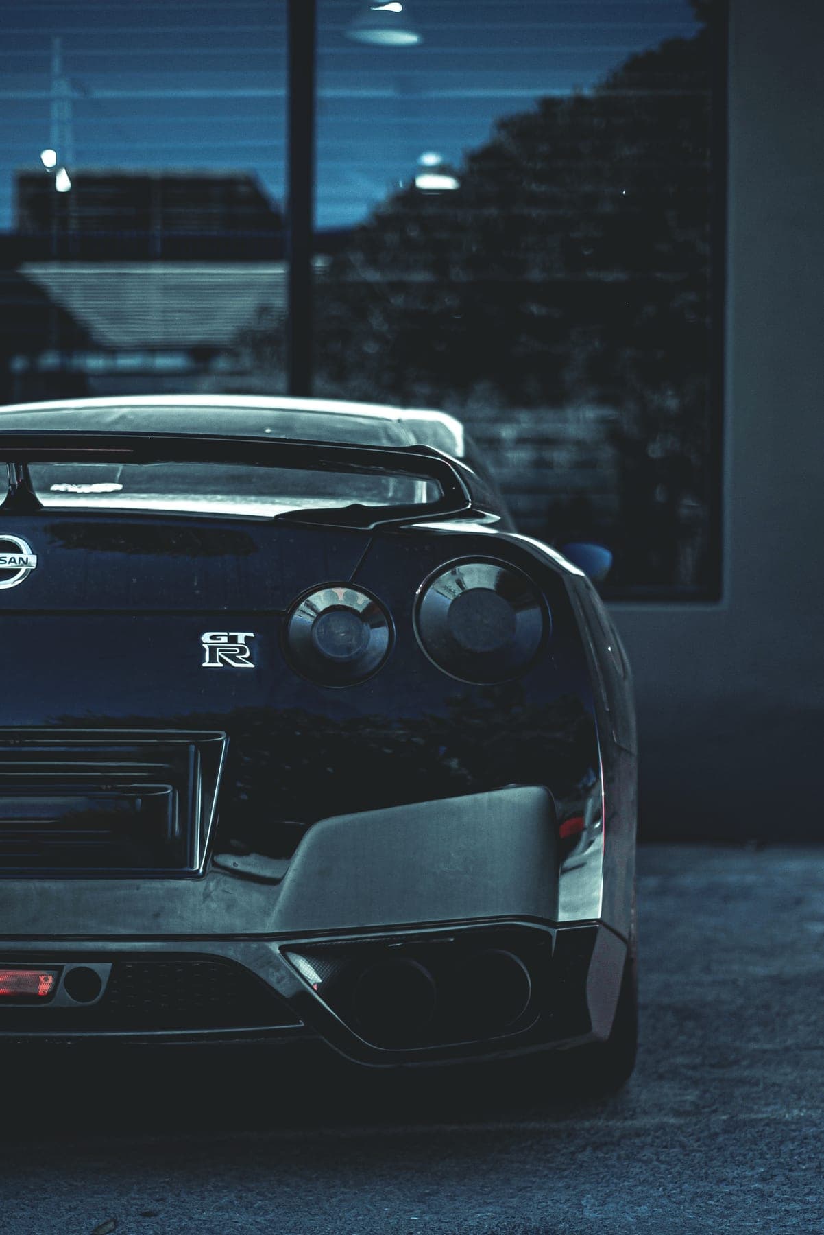 Black Nissan GT-R rear at dusk