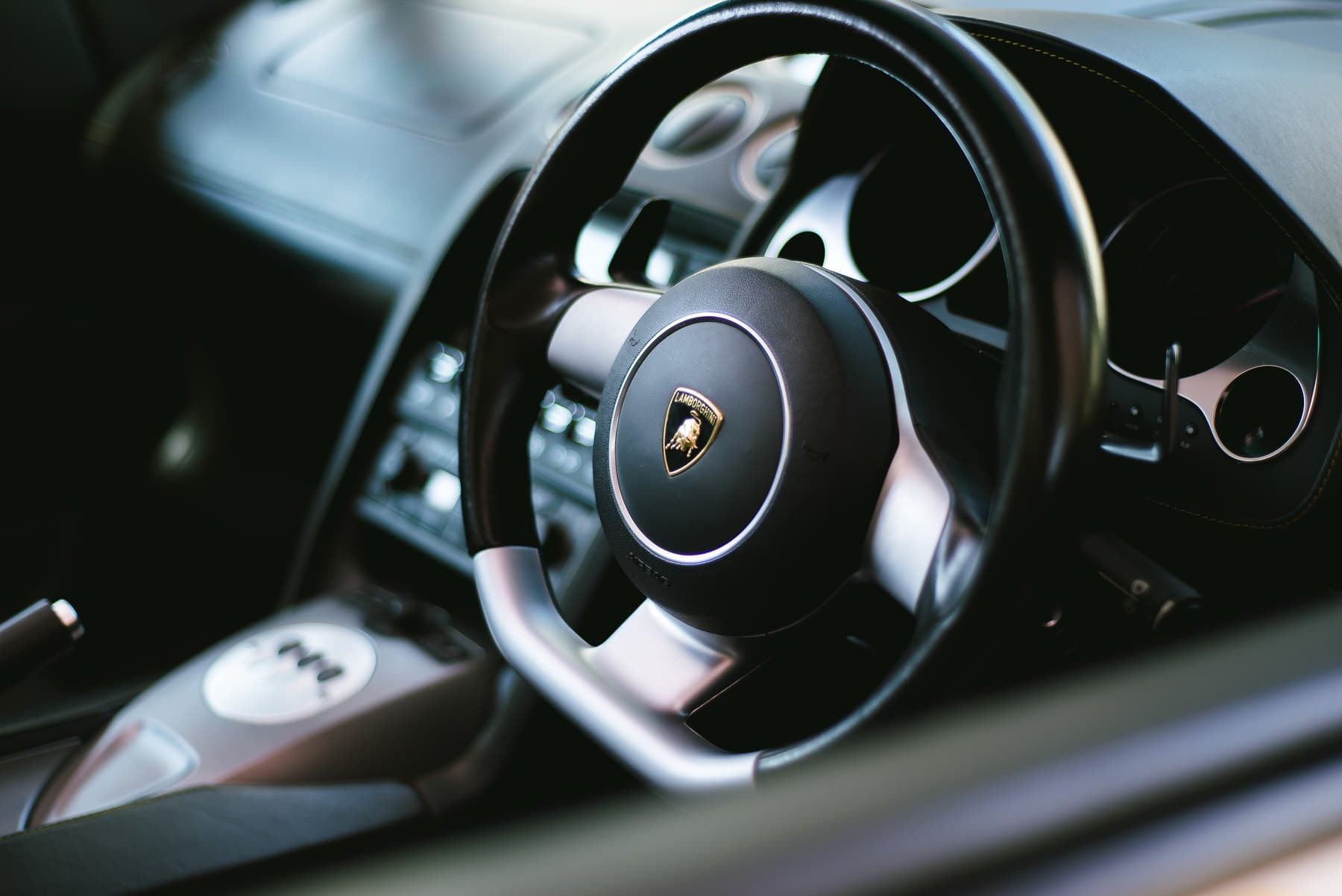 Lamborghini steering wheel through the window