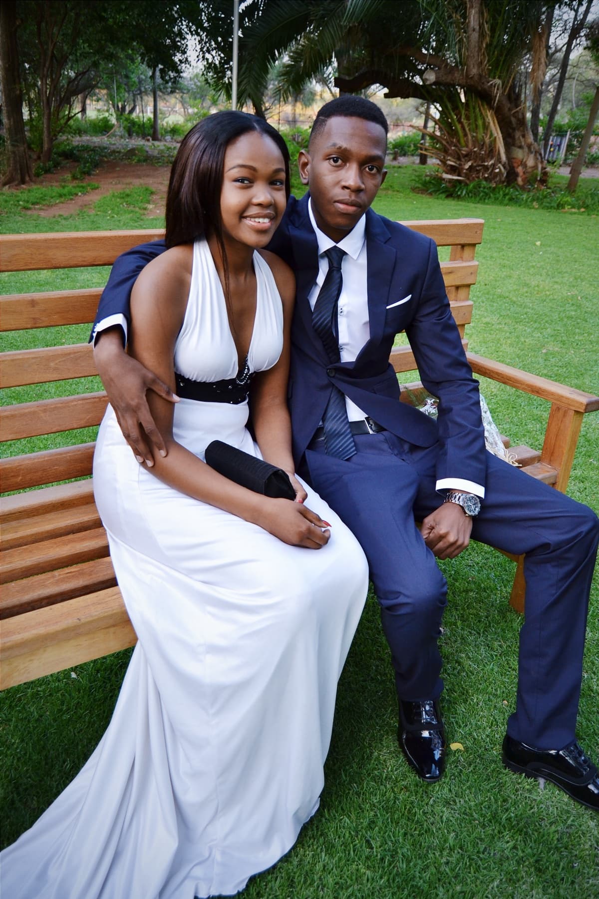 Matric dance couple close on the bench