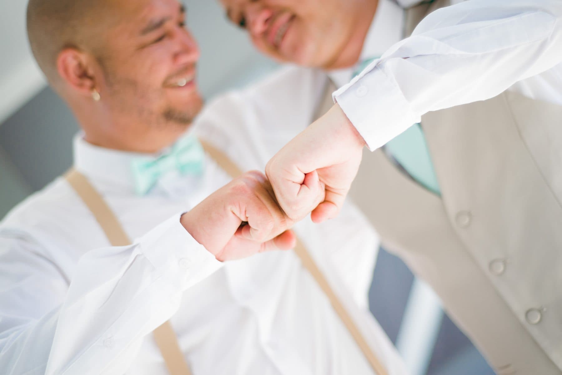 Groom fastening cufflinks