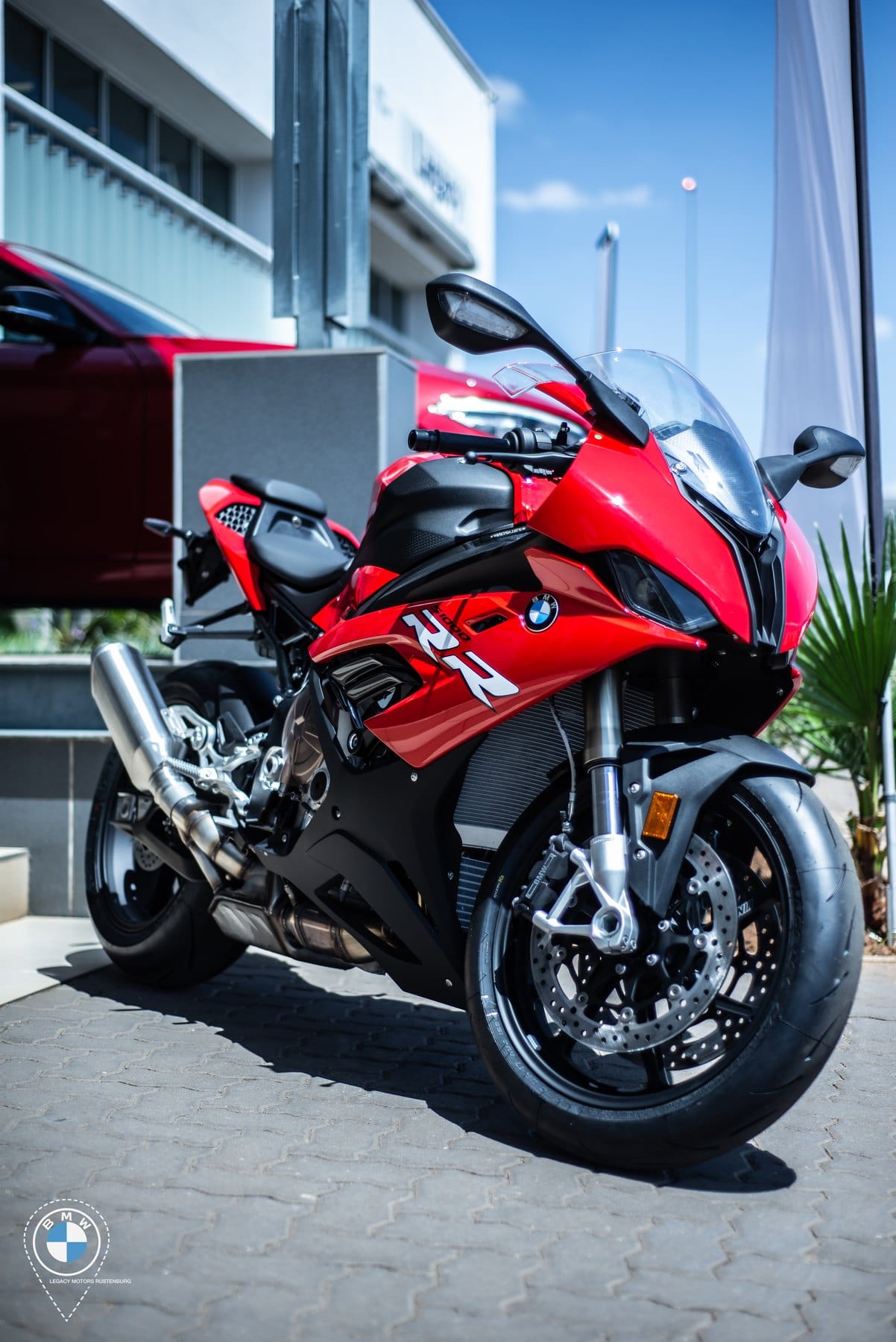 Red BMW S1000RR outside the dealership