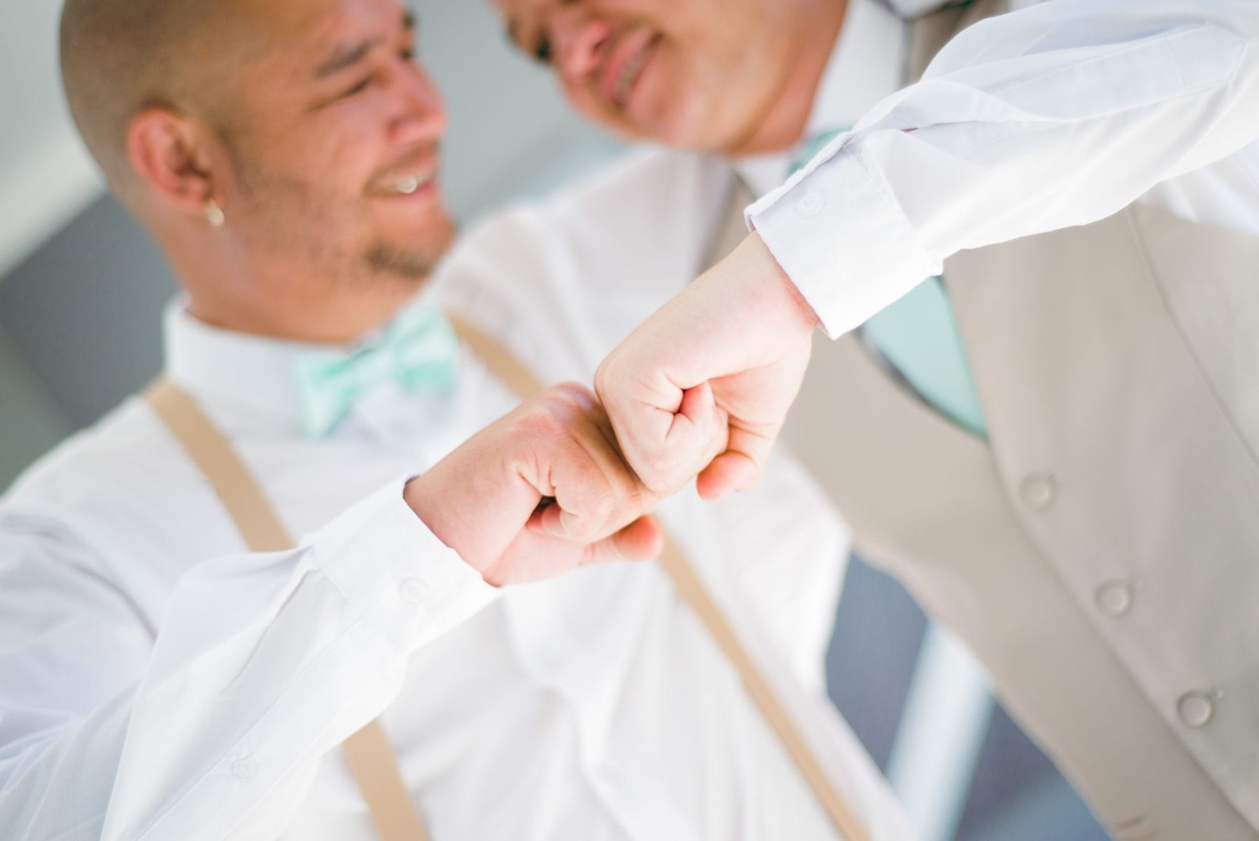 Groom fastening cufflinks